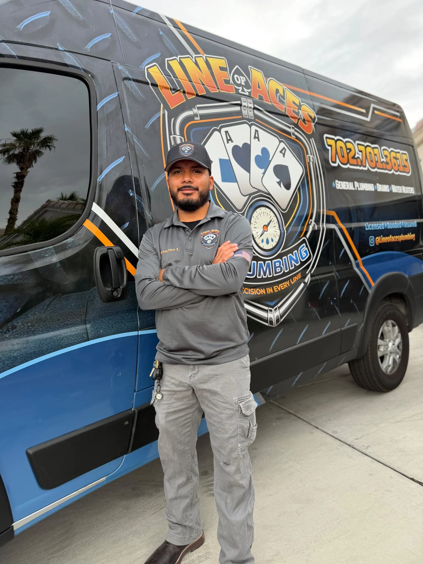 Brandon, Owner · Master Plumber, in front of the Line of Aces Plumbing service van in Las Vegas